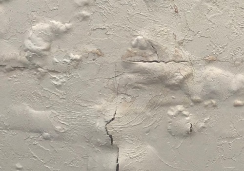 How do you fix water damaged paint bubbling?